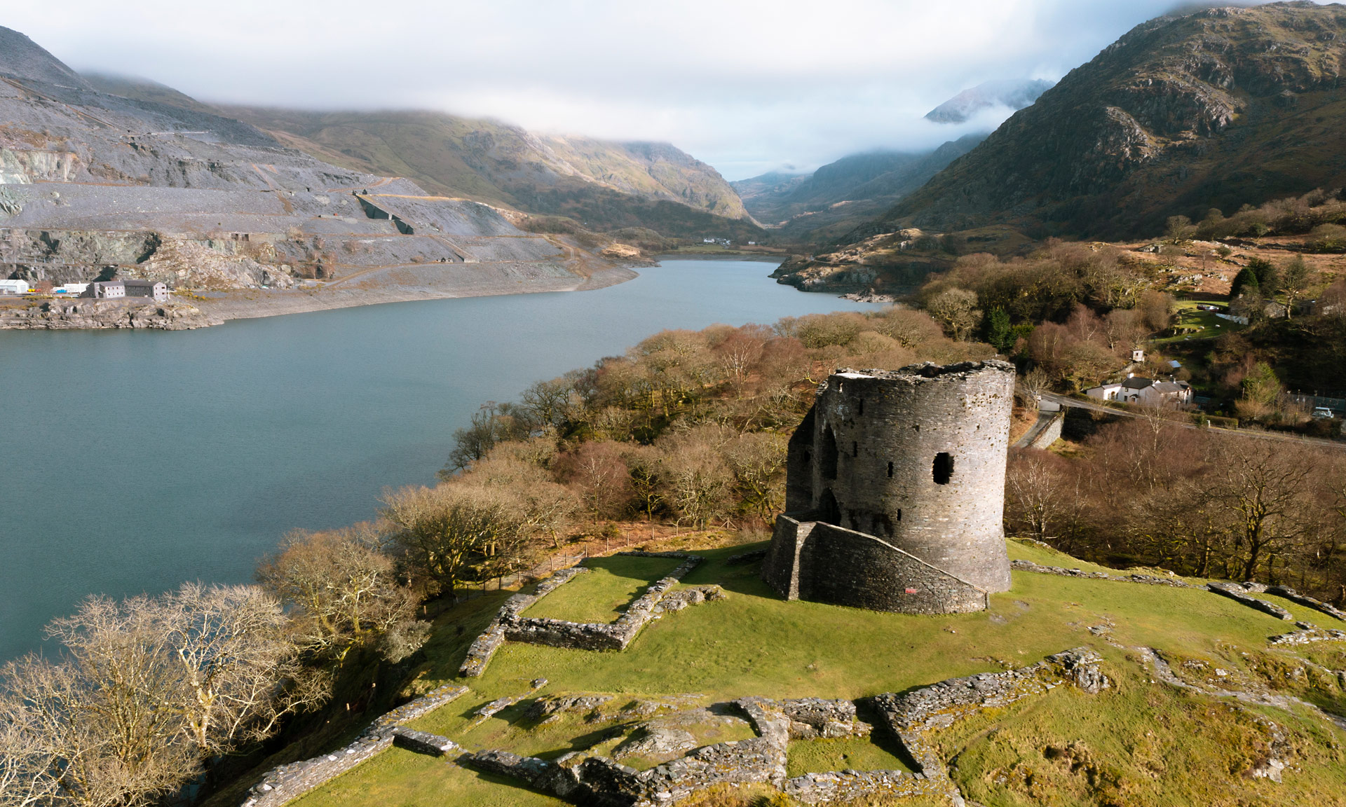 Aerial photo of Dolbadarn Castle with Llyn Peris reaching to the distance